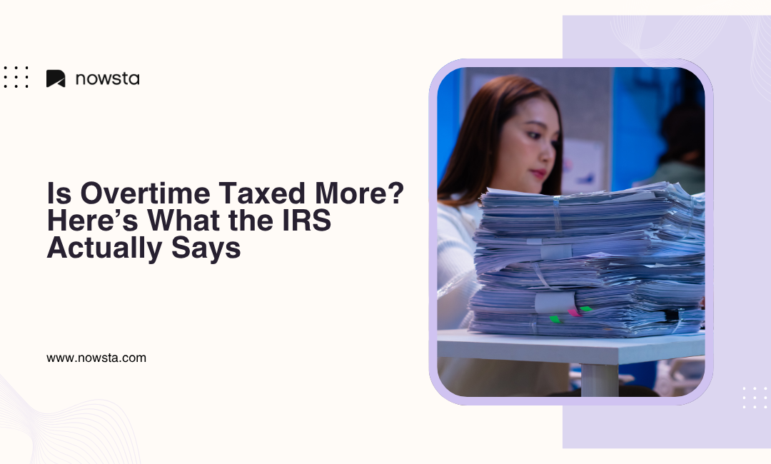 Professional reviewing large stack of documents representing payroll, taxes, and overtime management