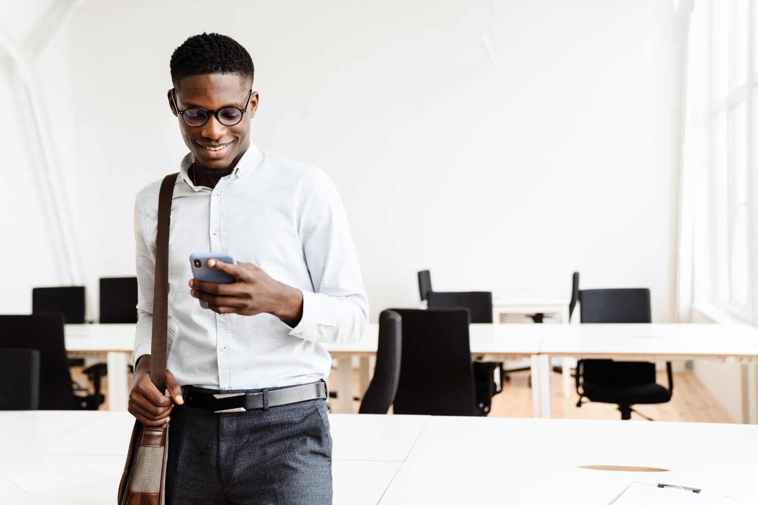 Employee checking a mobile work schedule on a phone