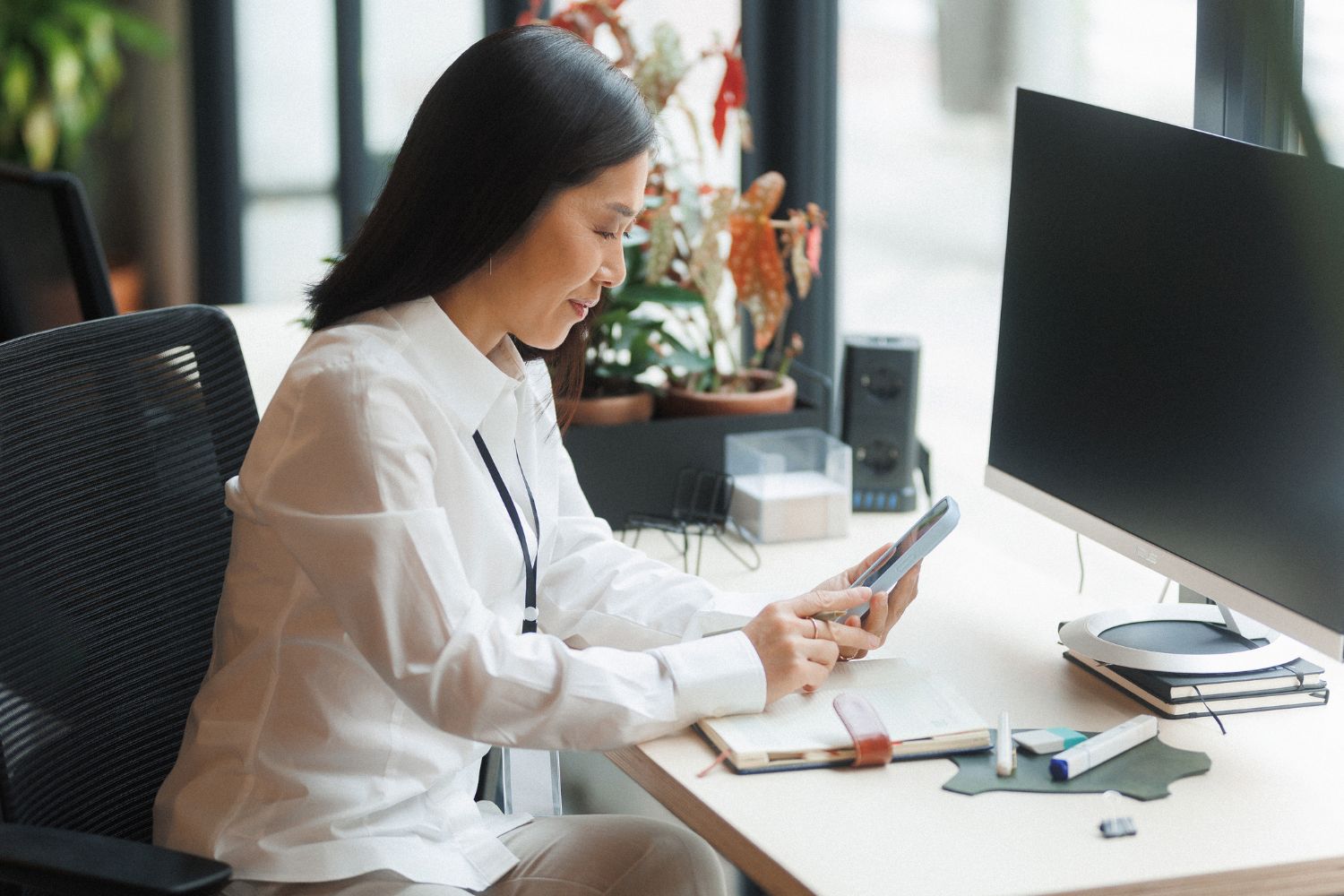 Employee checking a shift notification on a mobile phone