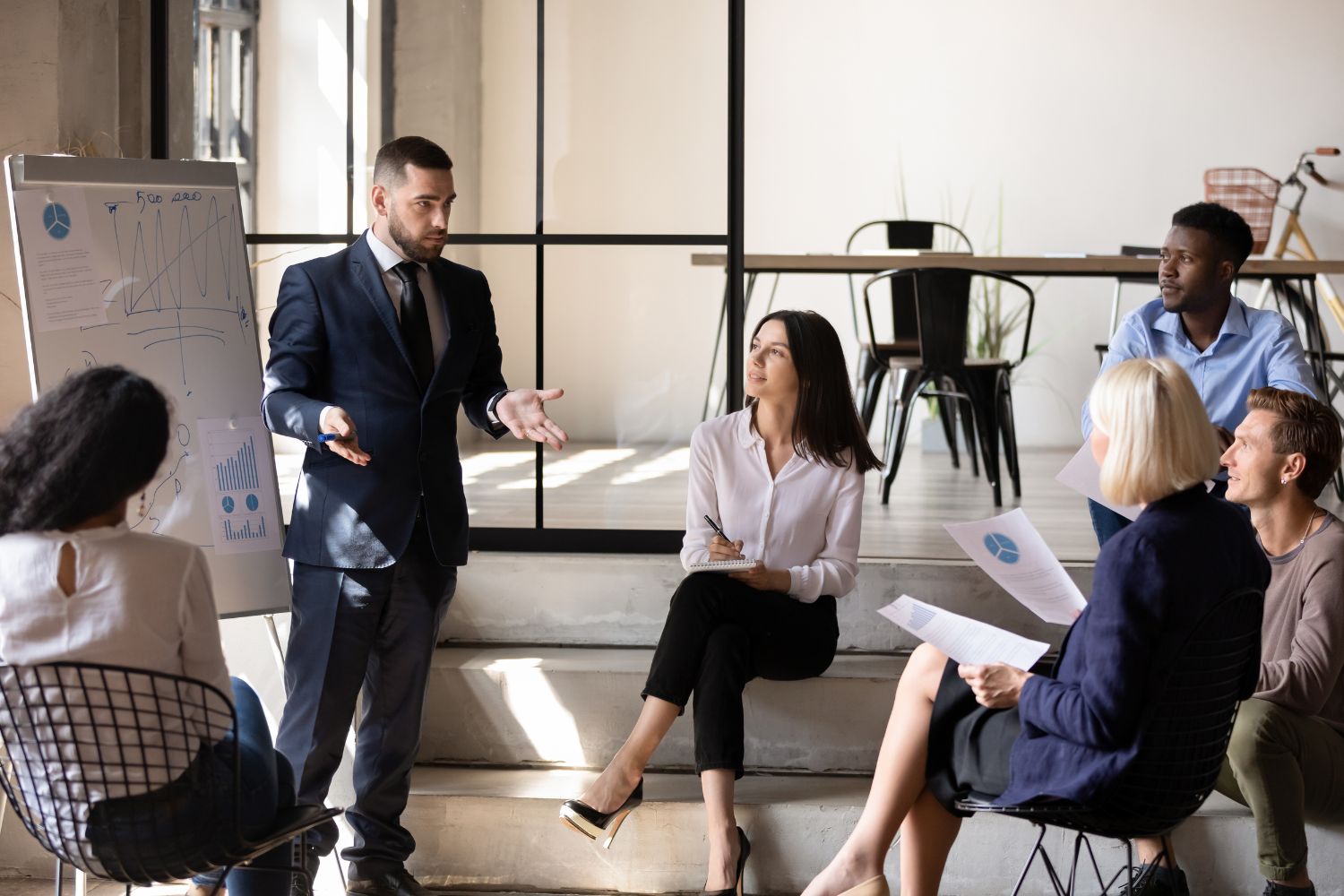 Manager sharing a workforce announcement with employees